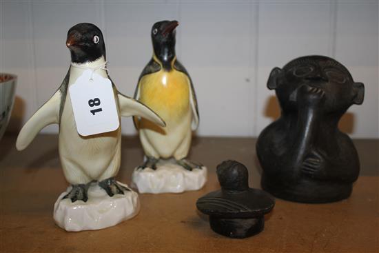 Two Staffordshire penguins (retailer T. Goode & Co) & an Afrcian figural box and cover